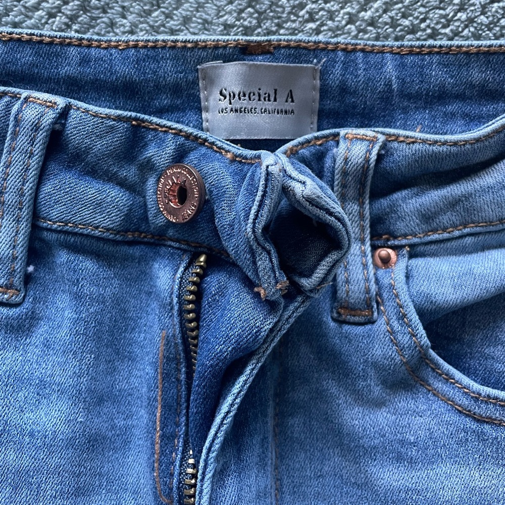 Juniors/Women size 3 distressed jeans